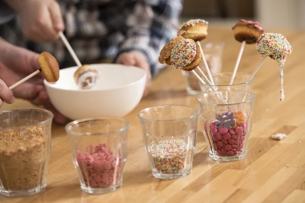 People Decorating cakepops Stock Picture