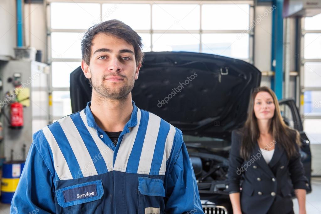 professional and confident mechanic posing