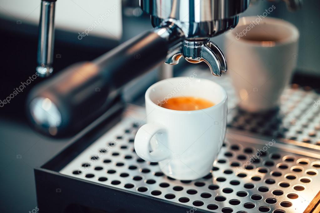 Close up image of espresso pouring into white cups Stock Photo by  ©digitalgenetics 101696560
