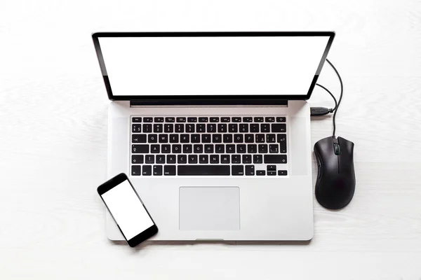 Top view of laptop on wooden background — Stock Photo, Image