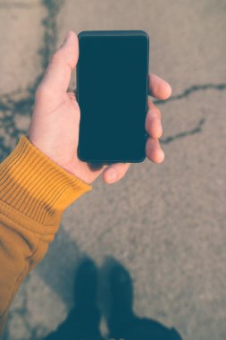 Using smartphone mobile on the street