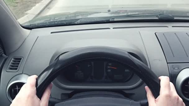 Woman driving car, hands on steering wheel — Αρχείο Βίντεο
