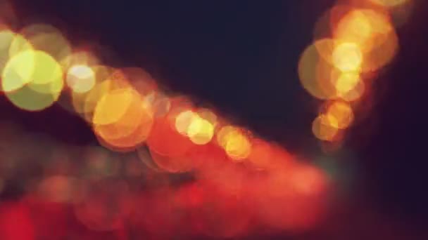 Explosión de partículas de luz bokeh explotando, fondo colorido abstracto — Vídeos de Stock