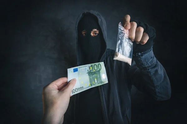Drug dealer offering narcotic substance to addict on the street — Stock Photo, Image
