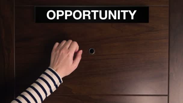 Woman knocking on the doors of Opportunity — Stock Video