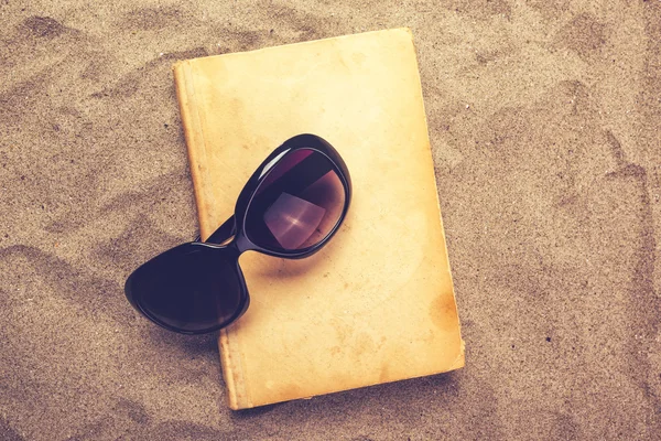 Reading favourite old book on summer vacation beach holiday — Stock Image Reading favourite old book on summer vacation beach holiday Stock Picture
