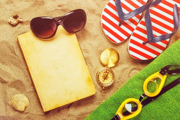 Summer beach holiday vacation accessories on sand surface — Stock Photo, Image