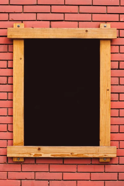 Blank menu blackboard on cafe wall — Stock Photo, Image