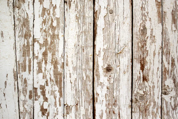 Pintura blanca despegando de la pared de madera — Foto de Stock