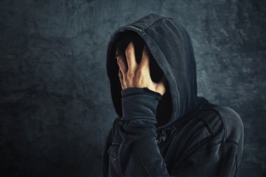 Hooded person fighting addiction crisis clipart