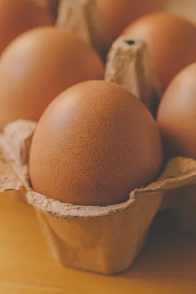 Chicken ginger eggs in cardboard box — Stock Photo, Image