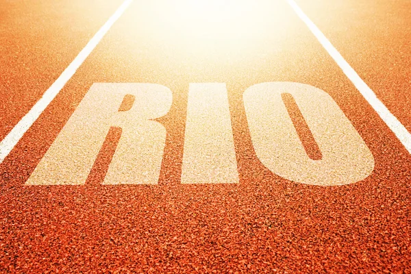 Ріо заголовок на Атлетичний спорт бігова доріжка — стокове фото