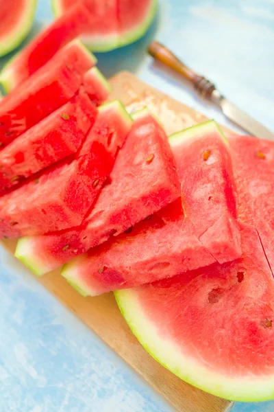 Watermelon slices on table — Stock Photo, Image