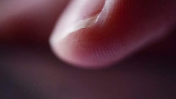 Close up of male thumb pushing mobile smartphone touch screen — Stock Video