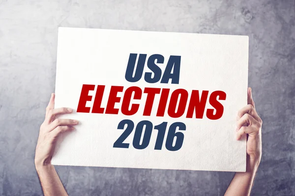 Elecciones en Estados Unidos 2016, hombre sosteniendo cartel — Foto de Stock