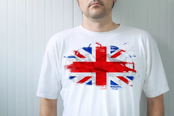 Man wearing white shirt with UK flag print — Stock Photo, Image