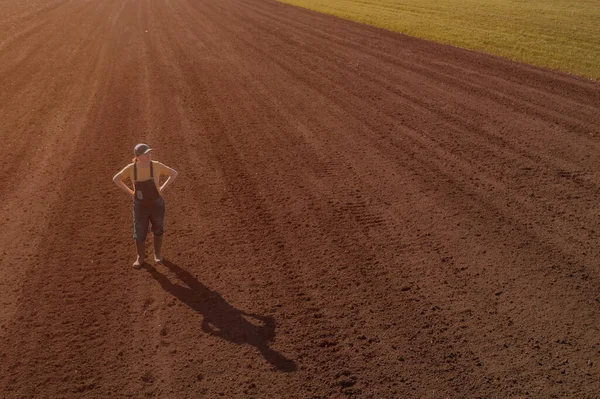 Satisfied Female Farmer Standing Ploughed Field Looking Distance Drone Photography — Stock Photo, Image