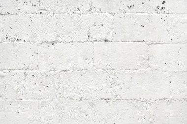 Arka plan olarak eski beyaz tuğla duvar, ev cephesinin grunge dokusu