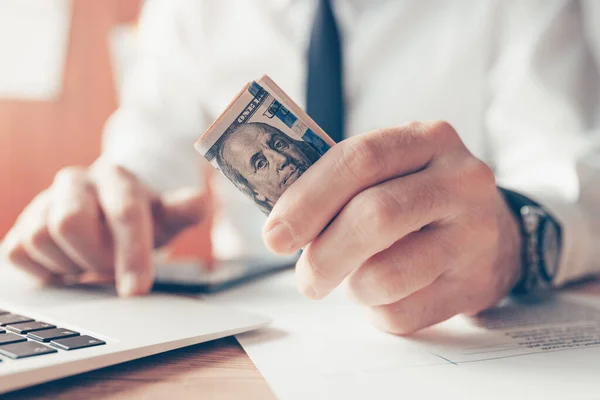 Business Revenue Concept Businessman Holding Dollars Hand Working Laptop Selective — Stock Photo, Image