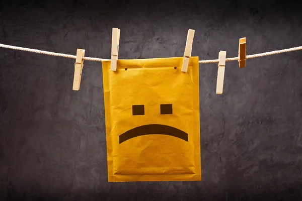 Sad face emoticon on mail Envelope — Stock Photo, Image