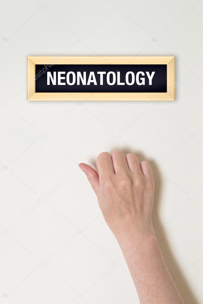 Female hand is knocking on Neonatology door