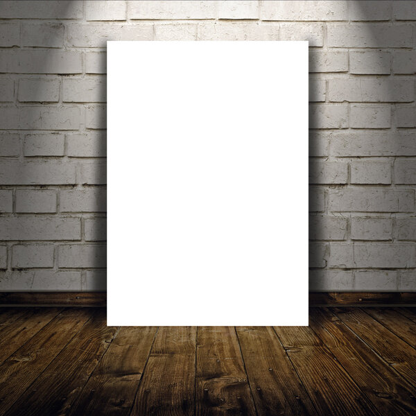 Blank poster as copy space template for your artwork or design in Vintage empty Room interior with white brick brick wall and wooden floor below the spot light.