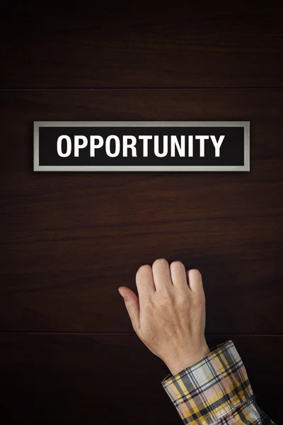 Hand is knocking on the doors of Opportunity — Stock Photo, Image