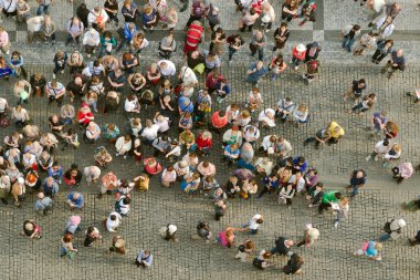 Tourists at Prague Old Town Square clipart