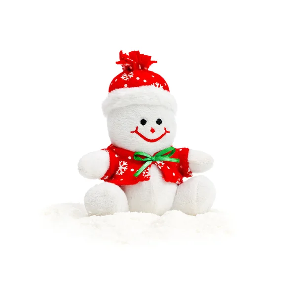 Smiling Generic Christmas Snowman Toy sitting on snow pile — Stock Photo, Image