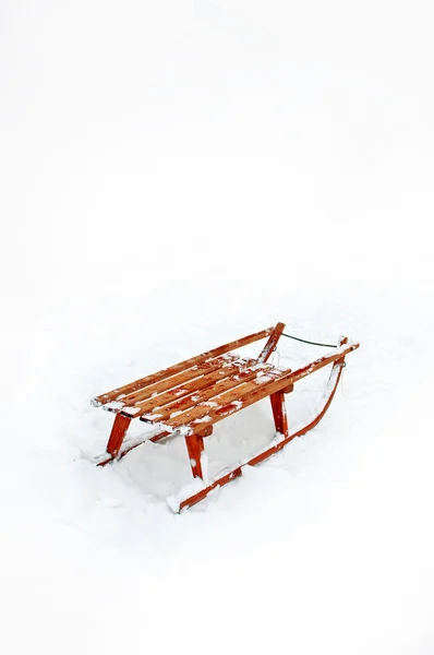 Wooden Sledge in the snow — Stock Photo, Image