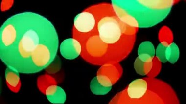 Renkli yanıp sönen bokeh Festival ışık arka plan defocused.