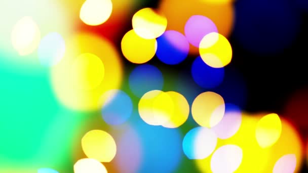 Beautiful colorful defocused bokeh festive lights as abstract holiday celebration background — Stock Video