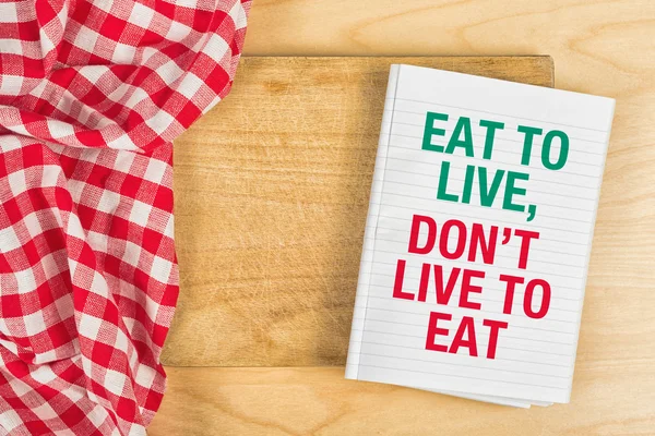 Spis for at leve, lev ikke for at spise - Stock-foto