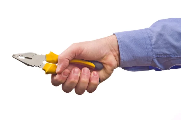 Male worker's hand holding combination pliers — Stock Photo, Image