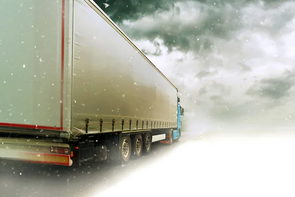 Speeding truck on Snowy road — Stock Photo, Image