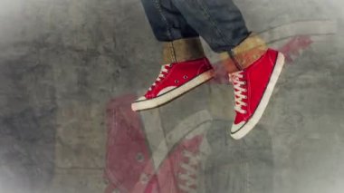 Loopable Stop Motion animasyon bir kot pantolon ve kırmızı spor ayakkabılar çalışan genç insan