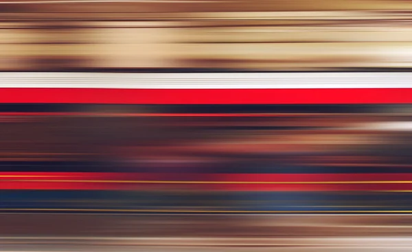 Trem de metrô desfocado desfocado em movimento como backg urbano abstrato — Fotografia de Stock