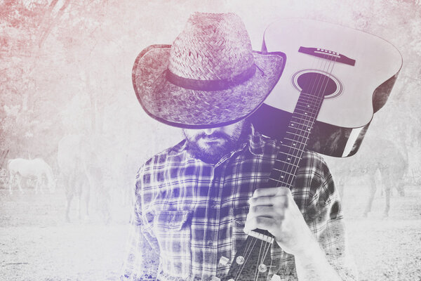 Cowboy Farmer with Guitar and Straw Hat on Horse Ranch