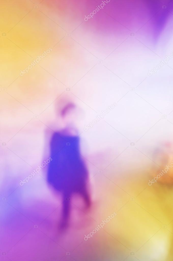 Blurred abstract silhouette of women walking down the stairs