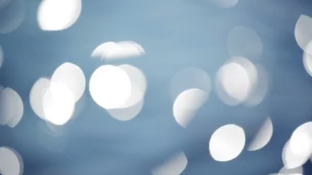 Abstract Water oppervlak Bokeh met golven en licht deeltjes Glittering in de zon, selectieve aandacht close-up 1920 x 1080 volledige Hd-beelden — Stockvideo