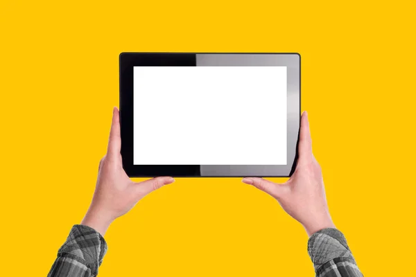 Woman Holding Digital Tablet Computer over Yellow Solid Backgrou — Stock Photo, Image