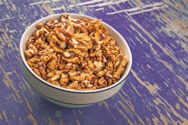 Walnuts in Bowl on Rustic Wooden Background — Stock Photo, Image