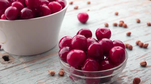 Hand Picking Sweet Cherry from Bowl — Stock Video