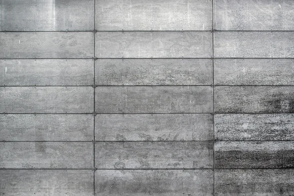 Parede de concreto com blocos retangulares em forma — Fotografia de Stock