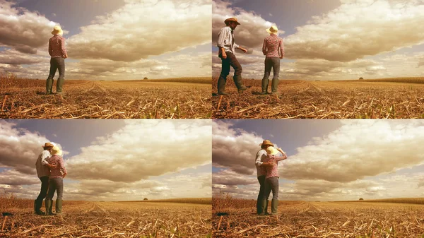 Jovem agricultor casal planejando nova estação de semeadura Fotos De Bancos De Imagens