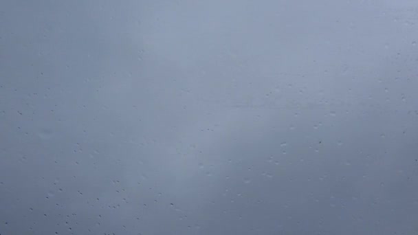 Gotas de chuva na janela do carro — Vídeo de Stock