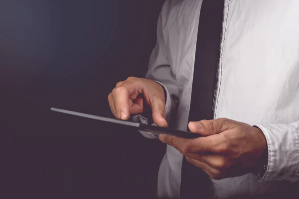 Businessman working on digital tablet computer — Stock Photo, Image