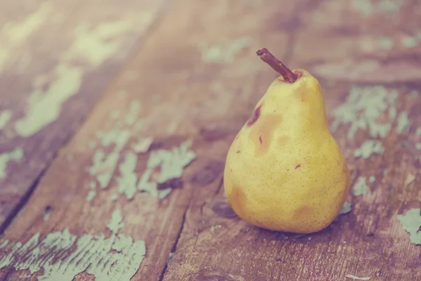 Retro toned ripe pear fruit — Stock Photo, Image