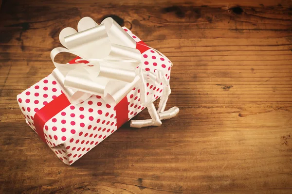 Christmas present on the table — Stock Photo, Image