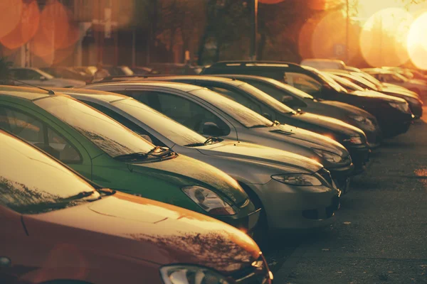 Rows of cars parked in residential district — Stockfoto